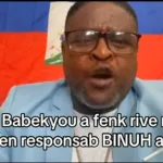 Jimmy “Barbecue” Chérisier reading his letter to BINUH Chief Carlos Ruiz-Massieu. Photo: Haiti Liberté.