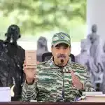 Venezuelan President Nicolás Maduro holds the Organic Law on the Security of the Nation during the inauguration of the militia activation cycle at the Bolivarian Military University, September 5, 2025. Photo: Presidential Press.