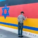 Street art showing a Star of David on the German flag. Photo: iStock/file photo.