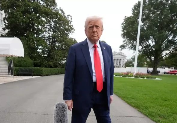 US President Donald Trump speaks to the media at the White House in Washington on September 21, 2025 before boarding Marine One to depart for Glendale, Arizona, to attend a memorial service for slain conservative commentator Charlie Kirk. Photo: Mark Schiefelbein/AP.