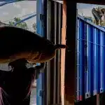 Loading up sacks of cocoa for export from San-Pédro, Ivory Coast. Photo: Pascal Maitre/Panos.