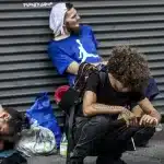 Homeless drug-addicts on a sidewalk in Philadelphia, USA. Photo: Reporte Asia.