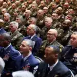 Members of the military attend a meeting convened by U.S. Defense Secretary Pete Hegseth in Quantico, Virginia. Photo: Kevin Lamarque/Reuters.