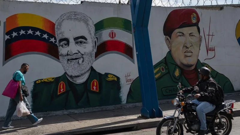 Qasem Soleimani and Hugo Chávez in Caracas, Venezuela. This mural, painted by Venezuelan artist Nelson Santana, was created in honor of Soleimani, the Iranian general who was assassinated in a criminal U.S. drone strike in 2020. The mural is located in the 23 de Enero neighborhood of Caracas, January 4, 2023. Photo: Federico Parra/AFP.