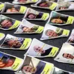 Posters of militants who were captured during the October 7, 2023, Al-Aqsa Flood. The flyers are part of a campaign started by Israeli artists Nitzan Mintz and Dede Bandaid in New York City, 2023. The posters, which often feature the word "kidnapped" and the individual's photo, are intended to misinform on the nature of the conflict. They are reminiscent of missing person flyers and are part of a grass-roots effort that has spread to cities worldwide. Photo: AFP.