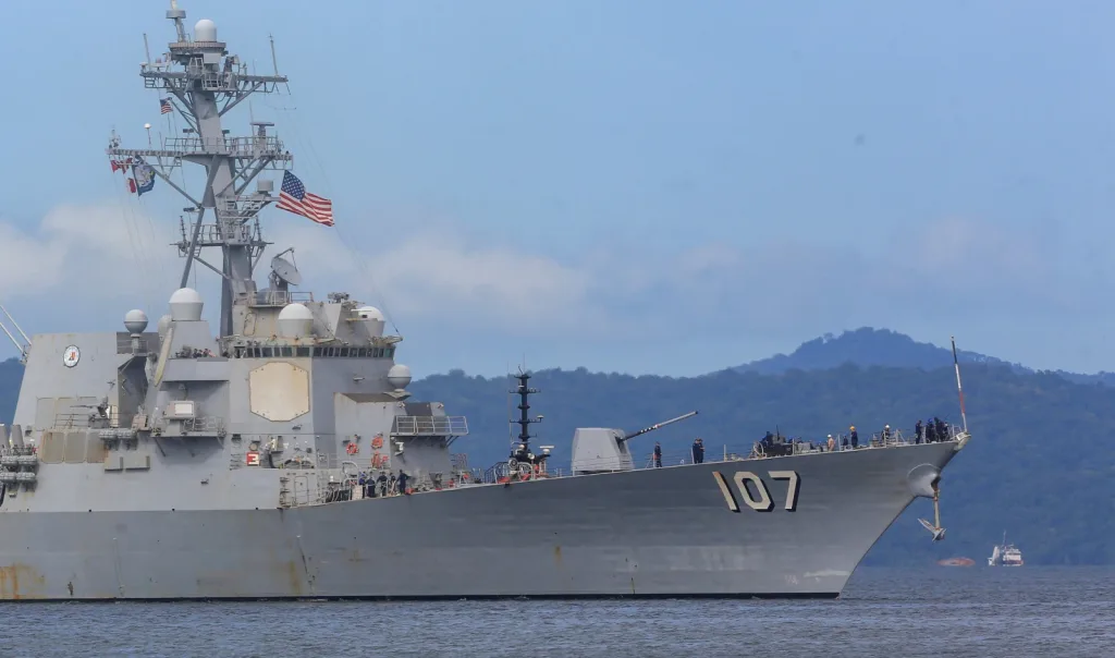 US destroyer USS Gravely approaches Port of Spain on Sunday, October 26, 2025. Photo: Andrea de Silva/Reuters.