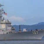 US destroyer USS Gravely approaches Port of Spain on Sunday, October 26, 2025. Photo: Andrea de Silva/Reuters.
