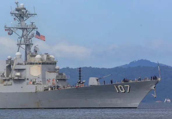 US destroyer USS Gravely approaches Port of Spain on Sunday, October 26, 2025. Photo: Andrea de Silva/Reuters.