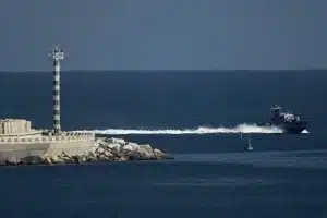 An Israeli Navy vessel moves in the Mediterranean Sea toward the port of Isdud, occupied Palestine, on Thursday, Oct. 2, 2025. Photo: AP.