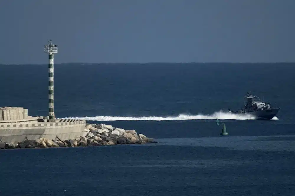 An Israeli Navy vessel moves in the Mediterranean Sea toward the port of Isdud, occupied Palestine, on Thursday, Oct. 2, 2025. Photo: AP.