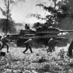 Counter-attack by Cuban Revolutionary Armed Forces supported by T-34 tanks near Playa Giron during the Bay of Pigs invasion, 19 April 1961. Photograph Source: Rumlin – CC BY 3.0