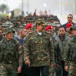 Venezuelan President Nicolás Maduro (center) walks with Defense Minister Vladimir Padrino López (right) and troops during military exercises in Caracas on January 22, 2025. Photo: Venezuelan Presidential Press/file photo.