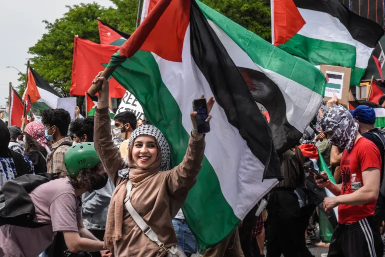 People participate in a pro-Palestinian rally calling for an end to the Israeli occupation in the Queens borough of New York City, US. Photo: Stephanie Keith/Getty Images/AFP.