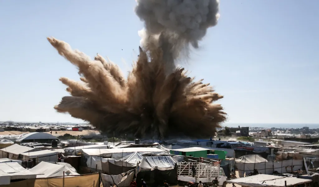 Israeli bombing of a Palestinian refugee camp in Gaza. Photo: AFP.