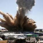 Israeli bombing of a Palestinian refugee camp in Gaza. Photo: AFP.
