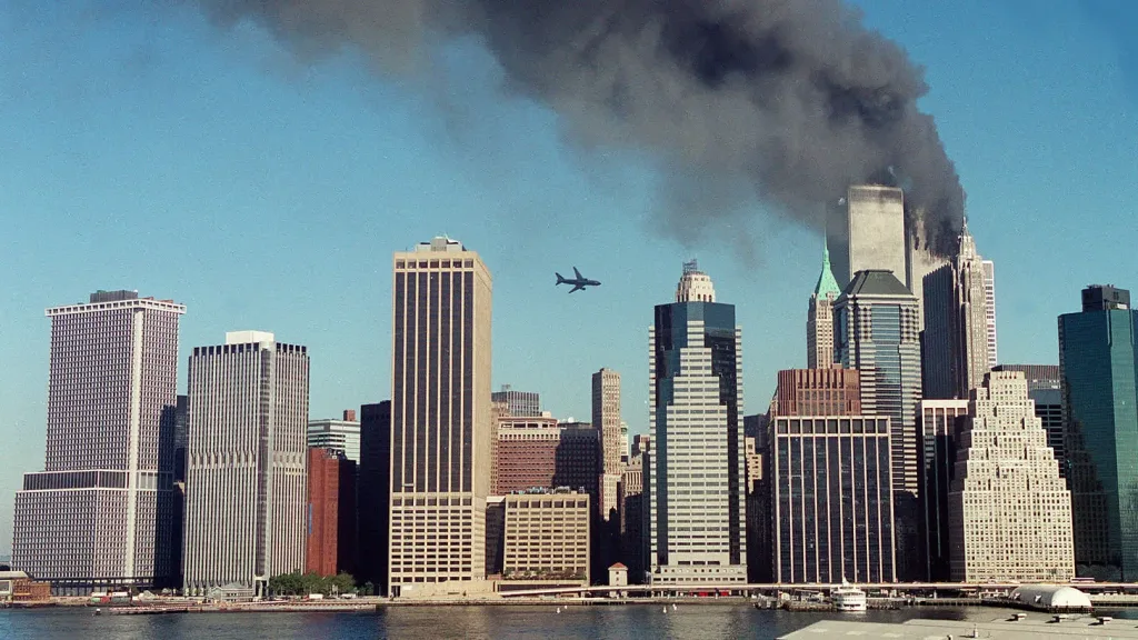 A second plane is seen flying over the city of New York while one of the towers of the World Trade Center is on fire. Photo: Global Delinquents/file photo.