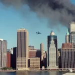 A second plane is seen flying over the city of New York while one of the towers of the World Trade Center is on fire. Photo: Global Delinquents/file photo.