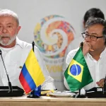 Brazilian President Luiz Inacio Lula da Silva (left) speaks next to Colombian President Gustavo Petro during a meeting for talks on the protection of the Amazon Forest, in Leticia, Colombia, on the border with Brazil, on July 8, 2023. Photo: Juan Barreto/AFP.