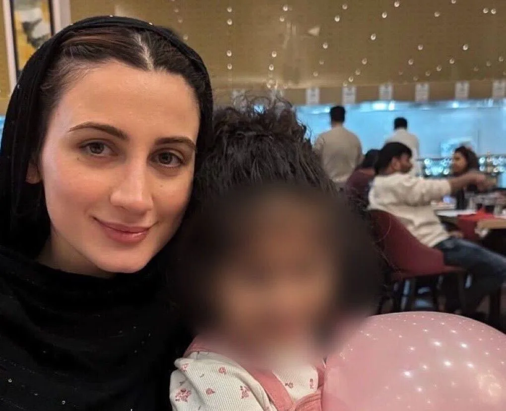 Teuta ‘T’ Hoxha pictured with her godchild. Photo: T Hoxha.