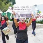 MST activists hold a protest in the Agrizone at COP 30, an area dedicated to discussions related to agribusiness, November 11, 2025. Photo: @alain.grao/COP30 Collaborative Coverage.
