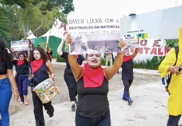 MST activists hold a protest in the Agrizone at COP 30, an area dedicated to discussions related to agribusiness, November 11, 2025. Photo: @alain.grao/COP30 Collaborative Coverage.