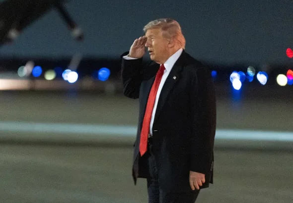 US President Donald Trump salutes as he arrives at Joint Base Andrews, November 2, 2025. Photo: AP.
