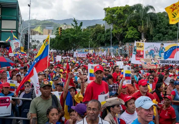 A pro-government march in Caracas, Venezuela against Donald Trump and US attacks, in Caracas in 2019. Photo: Ben Norton.