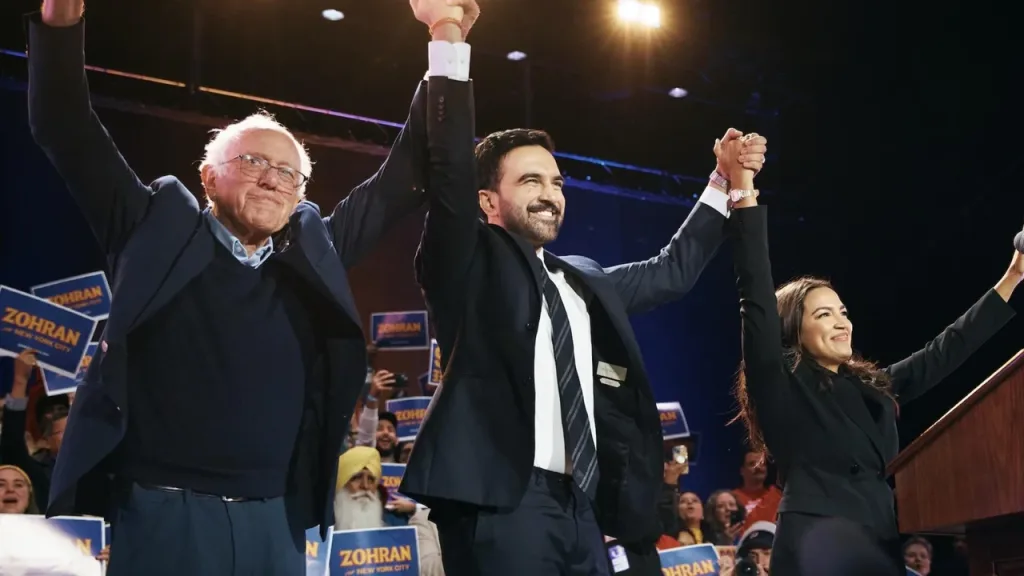 Sen. Bernie Sanders and Rep. Alexandria Ocasio-Cortez campaign for fellow democratic socialist Zohran Mamdani, now NYC mayor. Photo : Andres Kudacki/Getty/file photo.