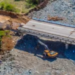 Heavy machinery removing debris from a bridge destroyed by Hurricane Melissa, in the municipality of Guamá, Santiago de Cuba province, Cuba. Photo: Facebook/Ministry of Transport of Cuba.