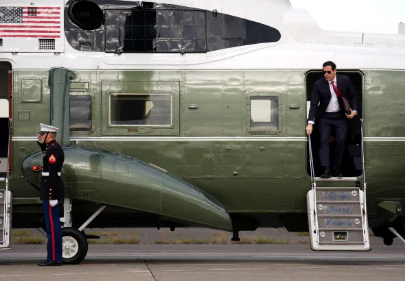 U.S. Secretary of State Marco Rubio disembarks from Marine One as he prepares to board Air Force One at Haneda Airport on October 29, 2025. Photo: Andrew Harnik/Getty Images.