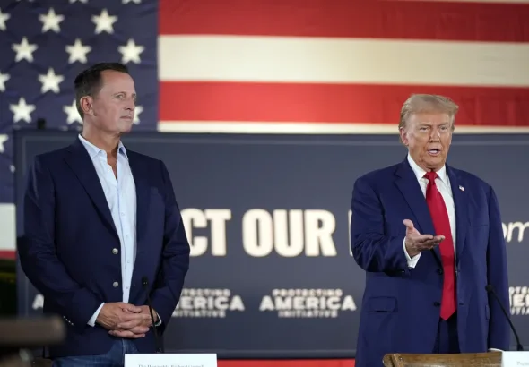 Richard Grenell (left) standing beside Donald Trump (right) at a 2024 campaign event. Photo: AP/Alex Brandon.
