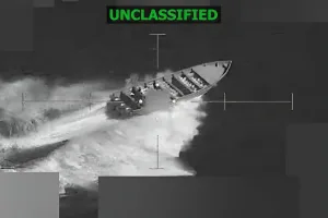 Screenshot from a video posted by the US Southern Command shows a strike on a small boat on November 15, at the direction of Secretary of War Pete Hegseth. Photo: X/@Southcom.