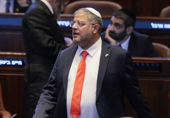 Israel's far-right minister Itamar Ben Gvir stands at the Knesset (parliament) in occupied al-Quds on October 13, 2025. Photo: AFP.