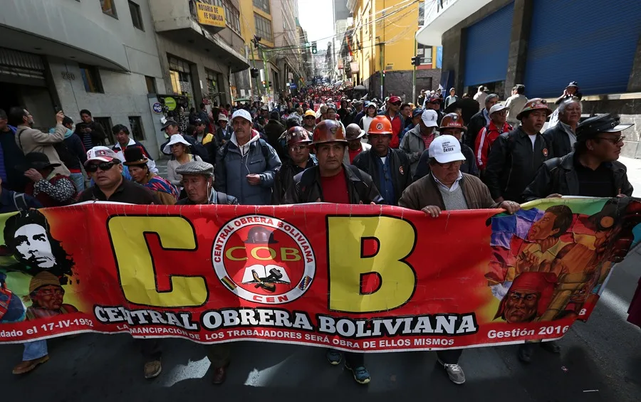Members of the Bolivian Workers' Central (COB) marching through the streets of La Paz, Bolivia. Photo: EFE/Martin Alipaz.