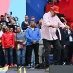 Venezuelan President Nicolás Maduro dancing a rap version of his recent calls for peace in English that has become viral in Venezuela, during a massive rally of support in Caracas on Monday, December 1, 2025. Photo: AFP.