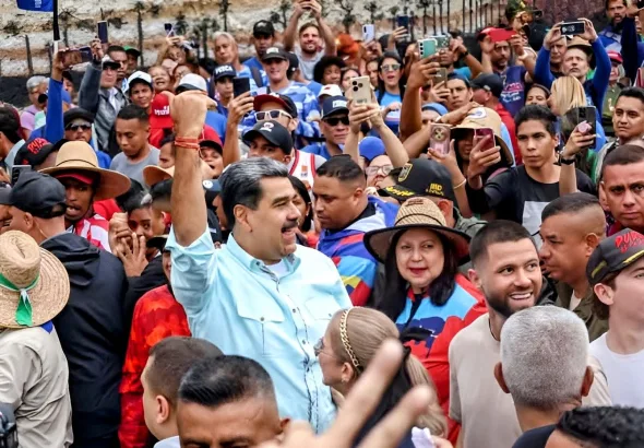 Venezuelan President Nicolás Maduro surrounded by supporters during a mass demonstration in Caracas on Wednesday, December 10, 2025. Photo: Venezuelan Presidential Press.
