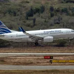 A Copa Airlines plane lands at Simón Bolívar International Airport in Maiquetía, La Guaira state, Venezuela. Photo: Carlos Becerra/Bloomberg/File photo.