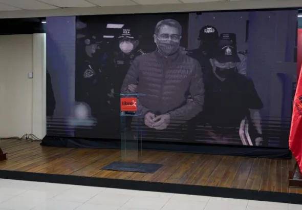 A screen displays an image of former Honduran President Juan Orlando Hernandez at a press conference of ruling Libre party presidential candidate Rixi Moncada, in Tegucigalpa, Honduras, Nov. 29, 2025. Photo: Moises Castillo/AP.