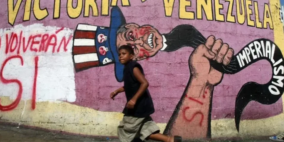 A 2007 mural in Caracas depicting "Uncle Sam," the figurative snake of imperialism. Photo: Mario Tama.