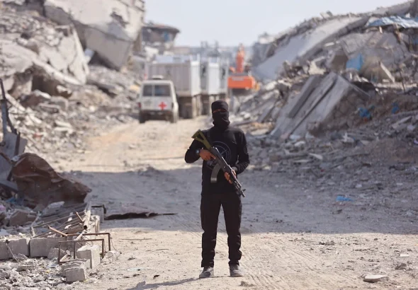 A Hamas resistance fighter stands in Gaza City on November 2, 2025. Photo: AFP