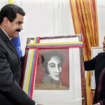 Then-Prime Minister of Trinidad and Tobago, Kamla Persad-Bissessar, received a portrait of Simón Bolívar from the President of Venezuela, Nicolás Maduro in 2015. Photo: Wired 868/file photo.