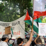 People carry flags of Palestine and Lebanon at a pro-Palestine march. File photo.
