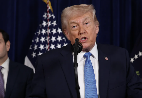 Donald Trump addressing the media on Saturday, January 3, 2026. Photo: Joe Raedle/Getty Images.