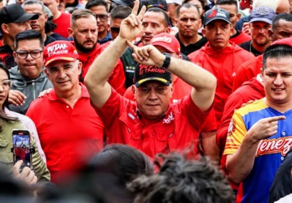 PSUV Secretary General Diosdado Cabello making the victory sign, popularized in Venezuela after the US kidnapping of President Maduro, during a massive Chavista demonstration on January 23, 2026. Photo: Con el Mazo Dando.