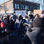 Thousands gather at the site of Alex Pretti's killing to demand ICE out. Photo: Gary Inman