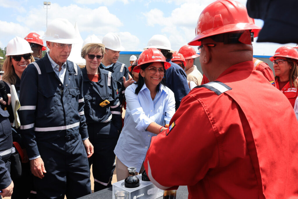 Venezuelan Acting President Delcy Rodríguez shakes hands with an oil worker standing next to US Energy Secretary Chris Wright, at the Petro Independencia PDVSA-Chevron joint venture in Morichal, Monagas state on Thursday, February 12, 2026. Photo: Jhonn Zerpa/Venezuelan Presidential Press.