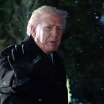 President Donald Trump speaks to reporter on the Sout Lawn before departing the White House, Friday, Feb 6, 2026, in Washington. Photo: AP.