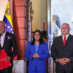 Venezuelan Acting President Delcy Rodriguez (center) next to National Assembly President Jorge Rodriguez (left) and Interior Minister Diosdado Cabello (right) in a ceremony to sign the recently approved Amnesty Law on Thursday, February 19, 2026, at Miraflores Palace. Photo: Ivan Mcgregor/Anadolu via Getty Images.