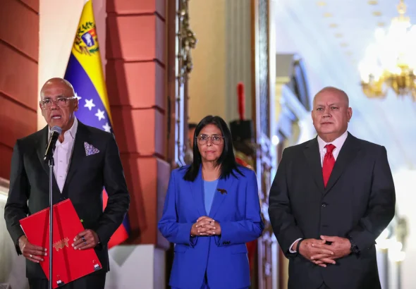 Venezuelan Acting President Delcy Rodriguez (center) next to National Assembly President Jorge Rodriguez (left) and Interior Minister Diosdado Cabello (right) in a ceremony to sign the recently approved Amnesty Law on Thursday, February 19, 2026, at Miraflores Palace. Photo: Ivan Mcgregor/Anadolu via Getty Images.