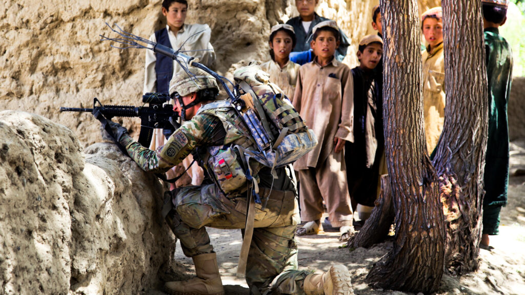 A US soldier takes position in Mush Kahel village, Ghazni province, Afghanistan, July 23, 2012. Photo: Andrew Baker.